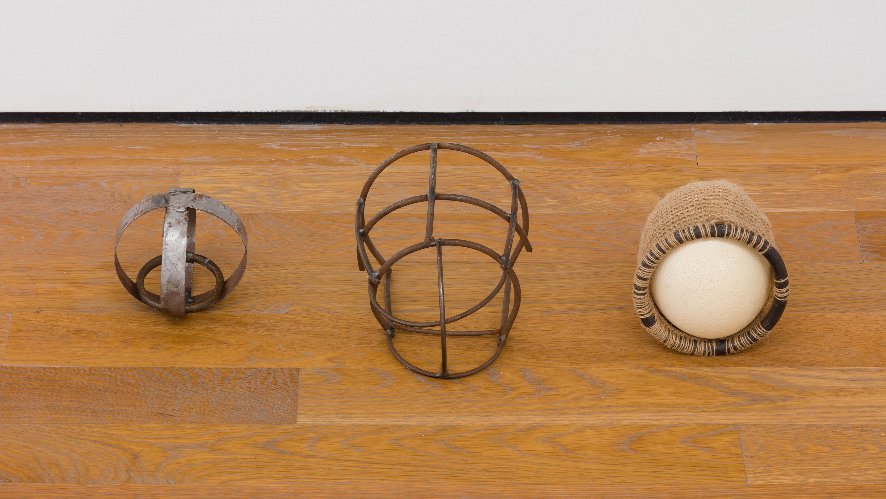 ektor garcia, esfera bozal huevo, 2020, welded steel, brass, ostrich egg, and crochet henequen, 7 x 26 x 9 in. (17.78 x 66.04 x 22.86 cm)  