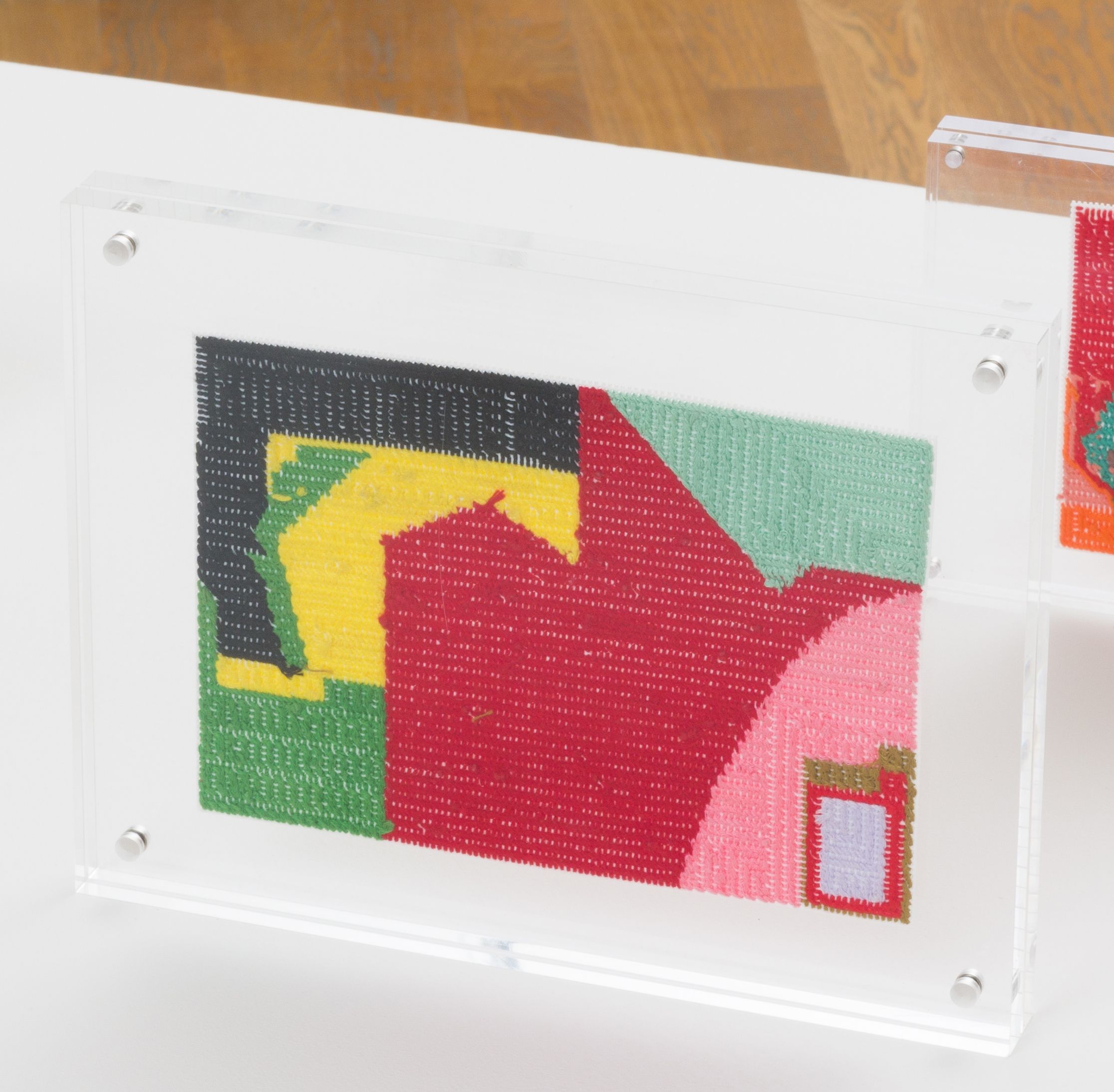 Steve Reinke, Untitled (needlepoint), 2021, floss on plastic backing, 6 x 9 in.