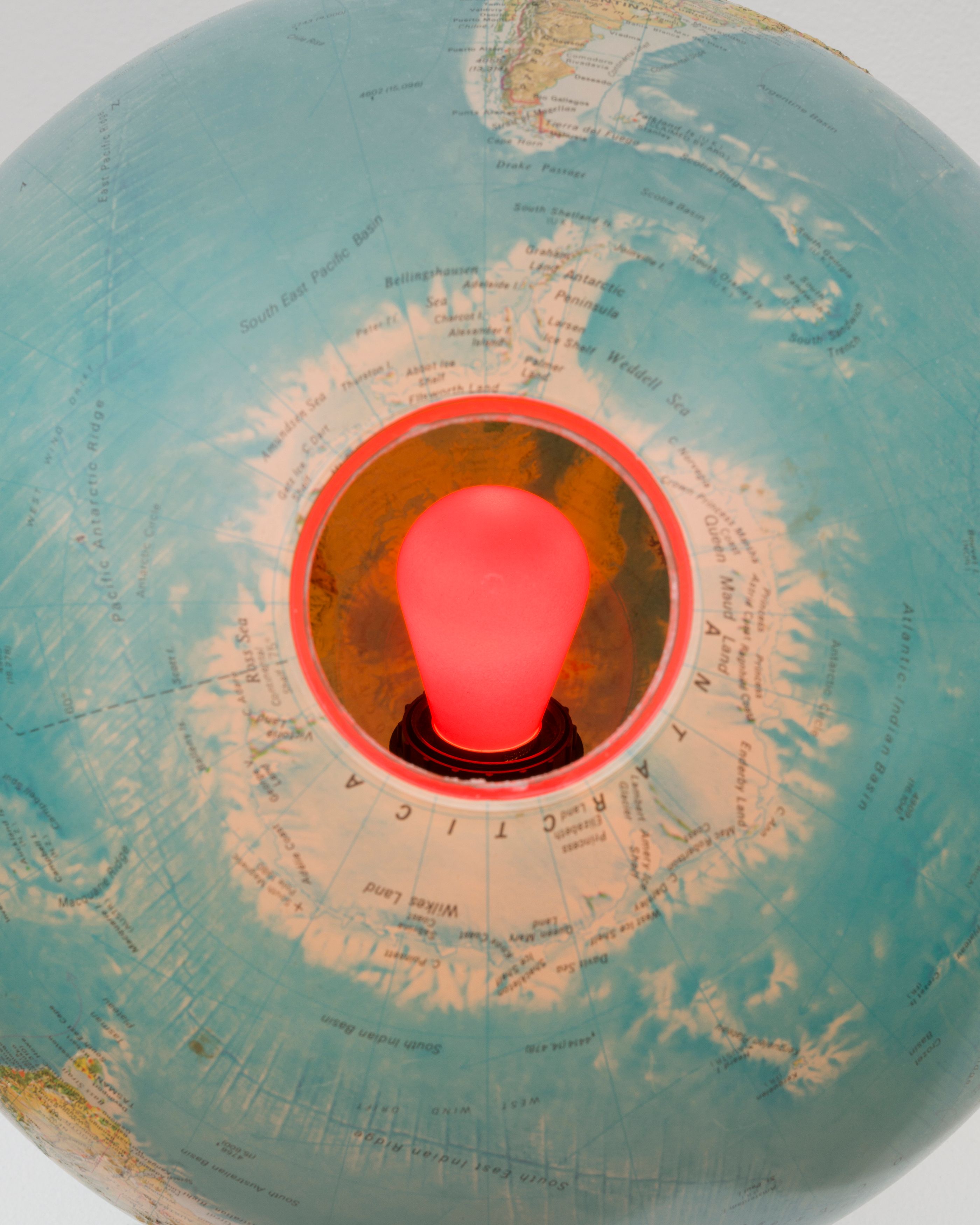 Danny McDonald, Title Forthcoming, 2022, detail of globe, light, pedestal, 12 x 12 x 13 in. (30.5 x 30.5 x 33 cm), pedestal dimensions: 12 x 12 x 41in. (30.5 x 30.5 x 104.1 cm) 