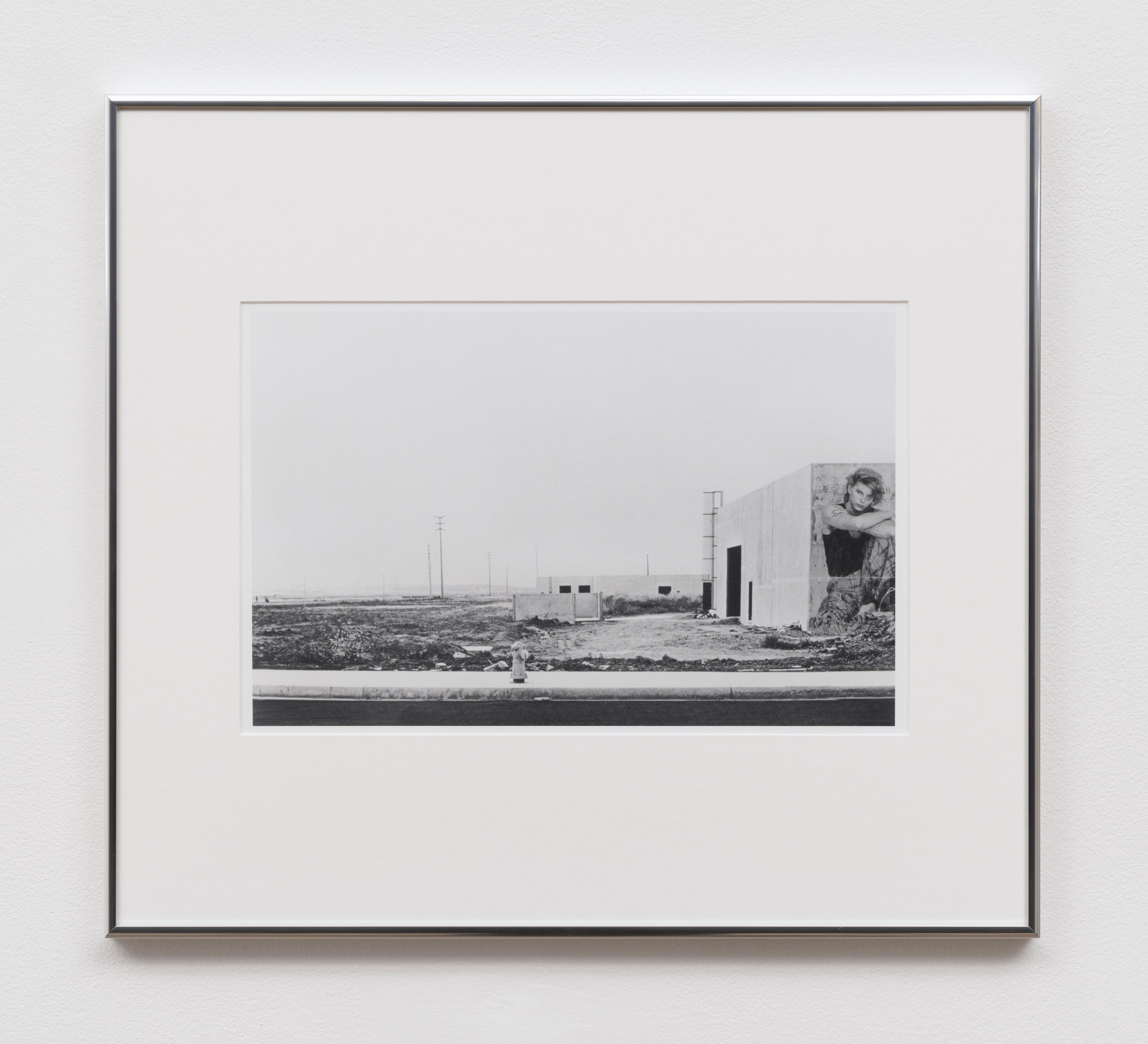 Erin Calla Watson, Alton Road at Murphy Road, looking toward, 2023, gelatin silver print, 8 9/10 x 14 in. (22.61 x 35.56 cm) (image size) 18 x 20 in. (45.72 x 50.08 cm) (framed size), edition of 3 with 2 AP