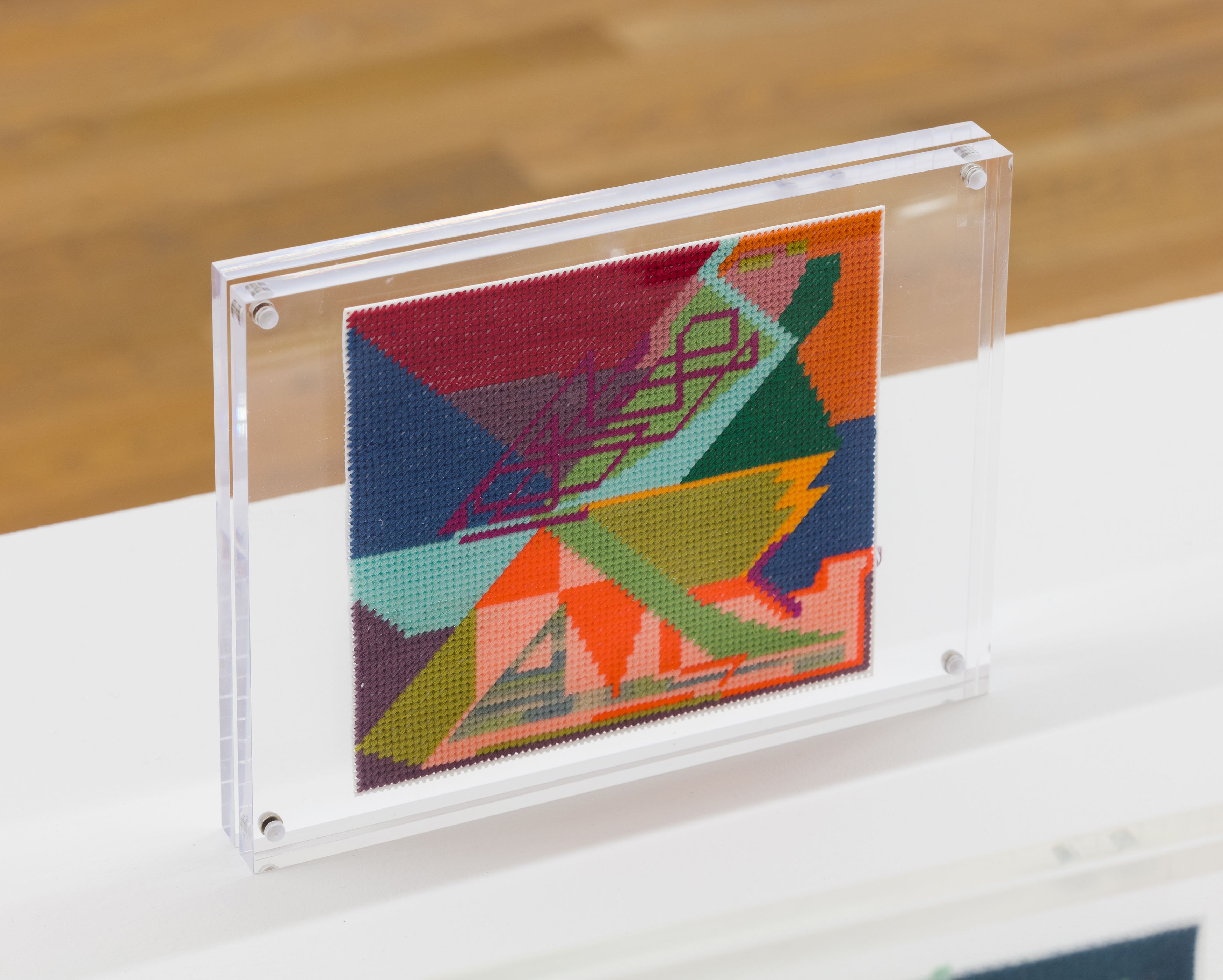 Steve Reinke, Untitled (needlepoint), 2020, floss on plastic backing, 5 1/8 x 5 3/4 in. (13.x 14.5 cm.)