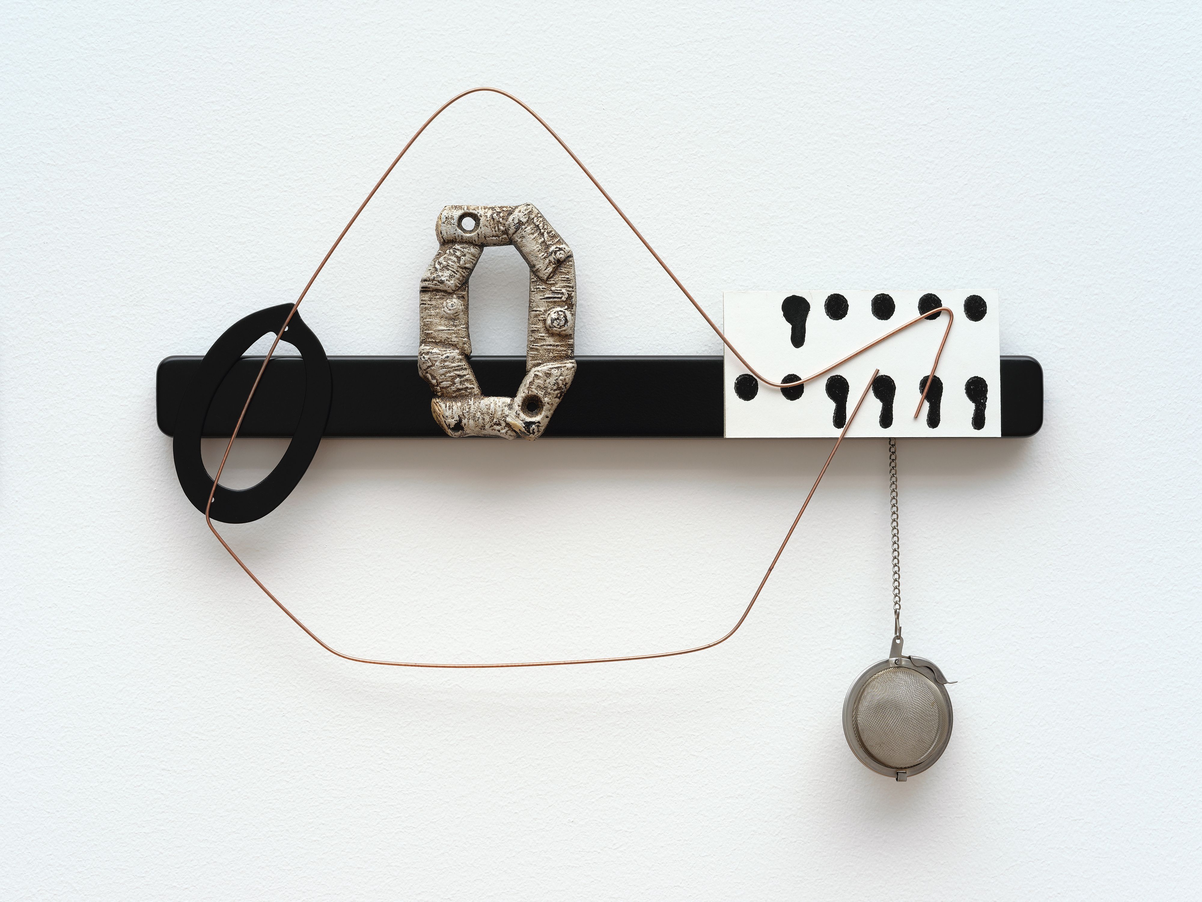 Sara Magenheimer, Across the Accordion of Sky and Telescoped Voices (After Cendrars), 2016, knife rack, steel wire, house numbers, painted pigment print, tea ball, 12 x 14 1/2 in. (30.48 x 36.83 cm)