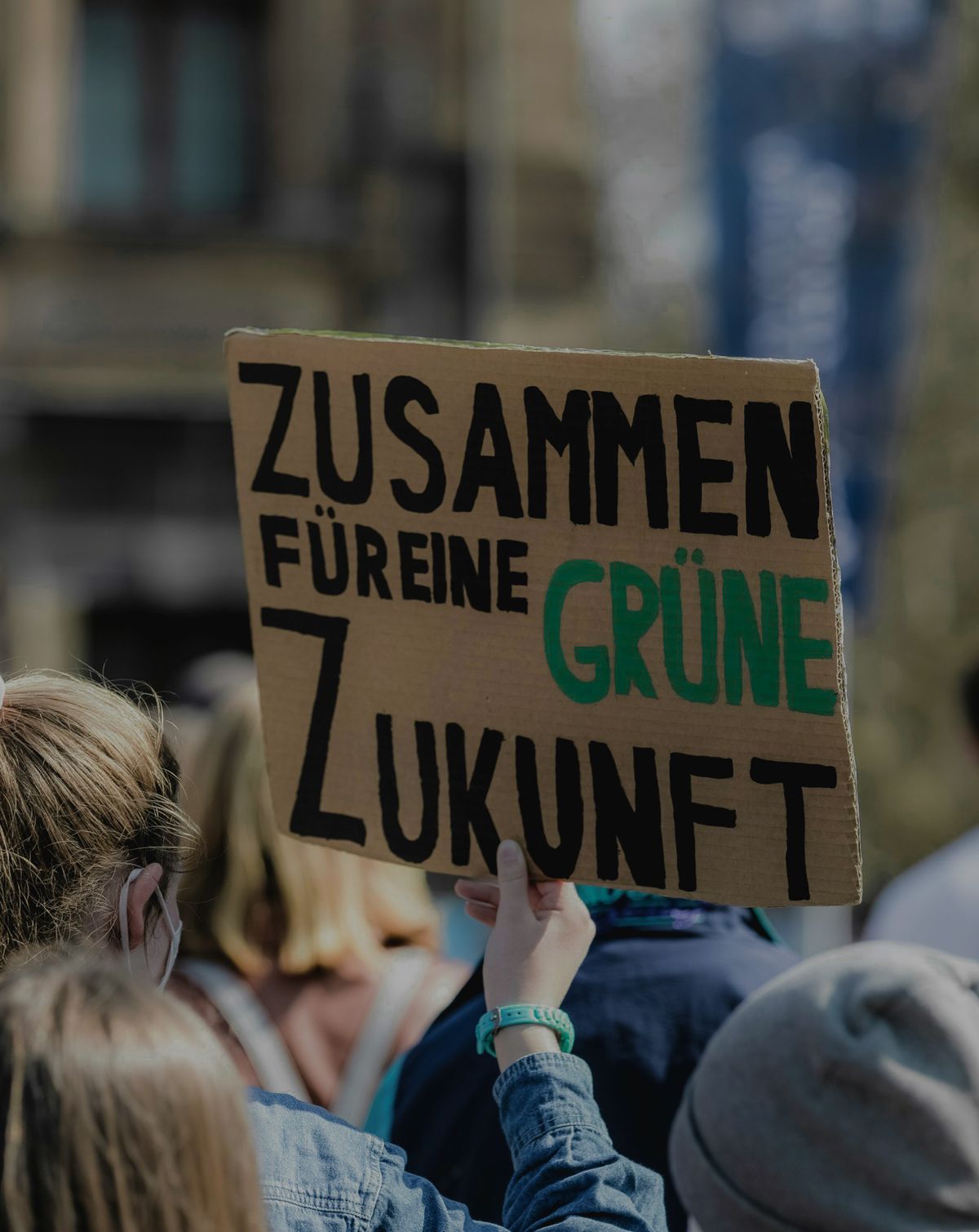 Fotografie einer Plakats an einer Klimademonstration