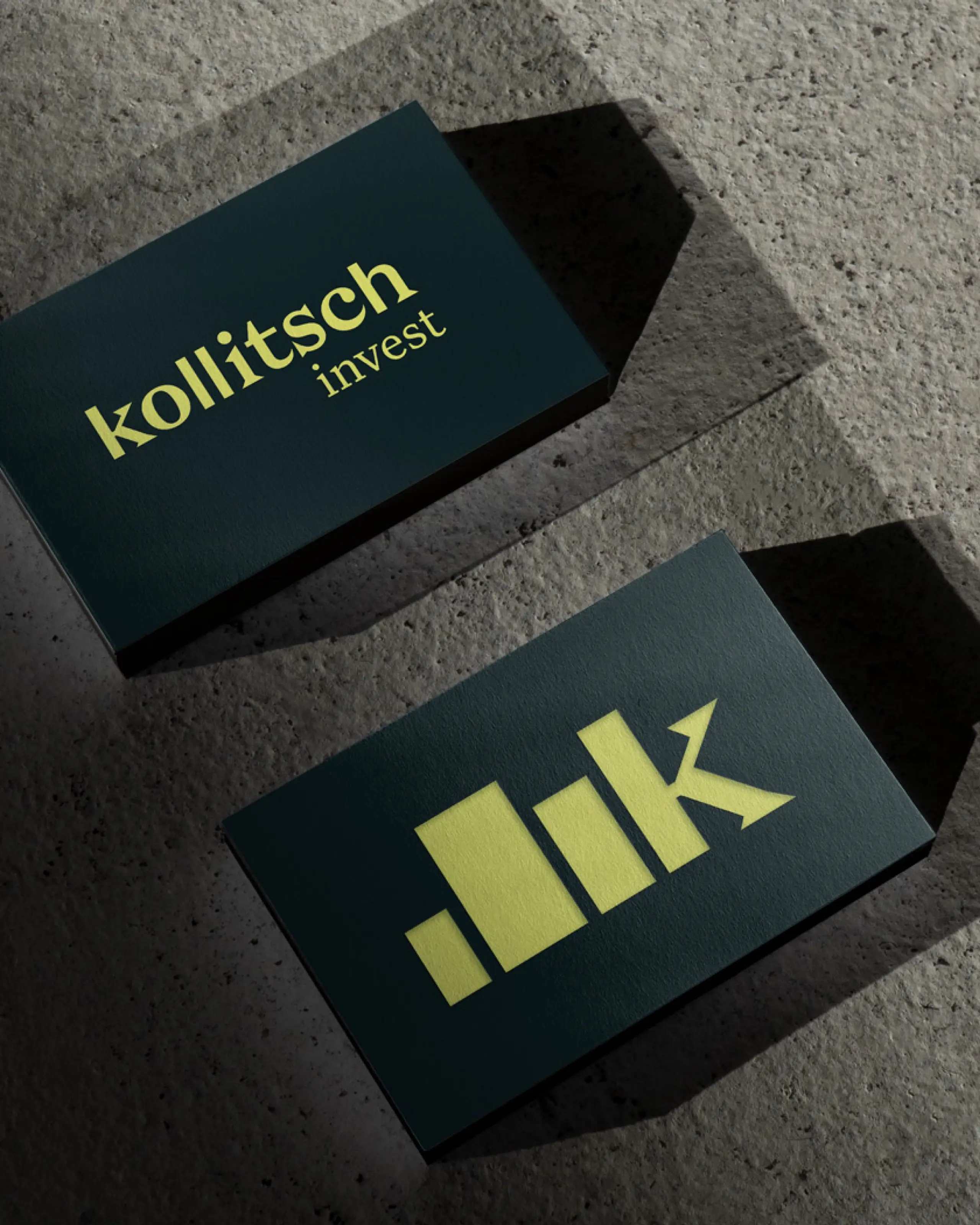 Close-up of Kollitsch Invest branding business cards