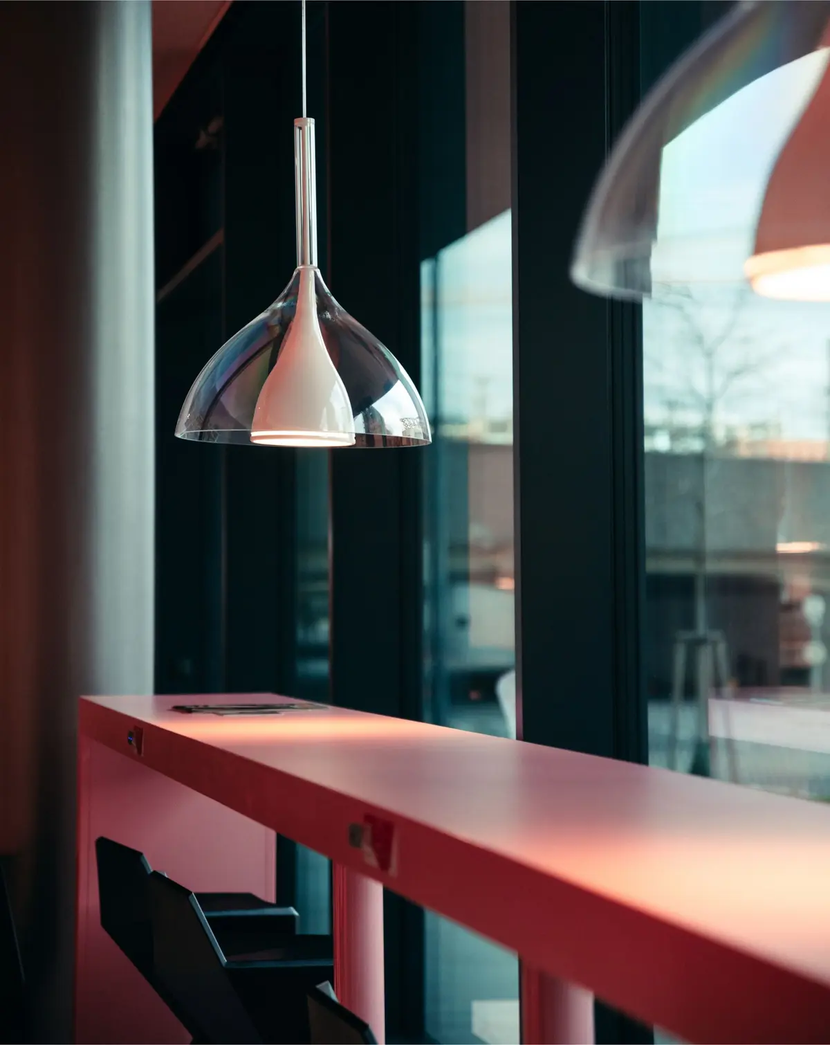 Modern pendant light over bar table