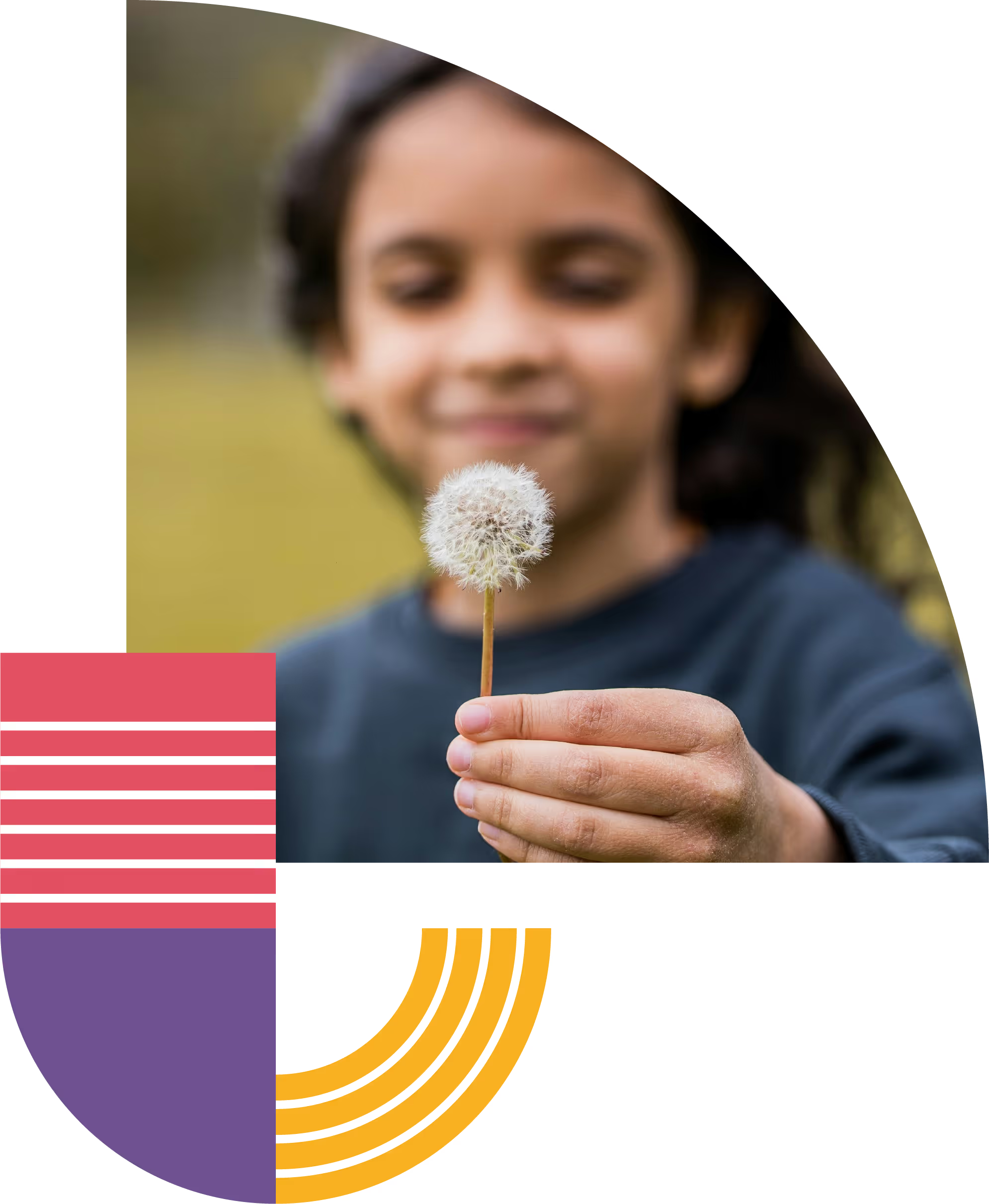 Boy holding a dandelion