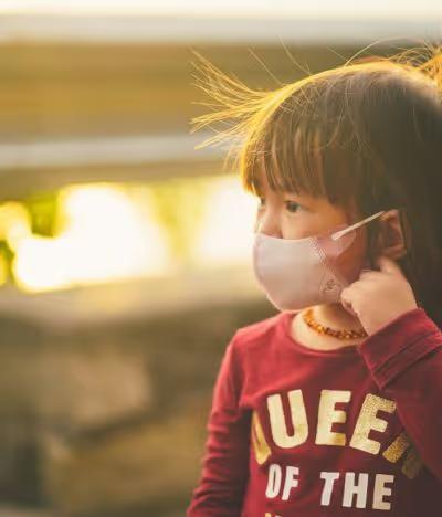 Young child wearing a face mask