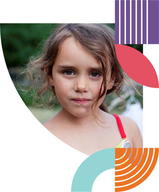 Young girl with long hair looking at the camera