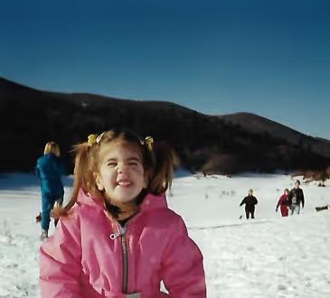 Vivien Skladany as a child in the snow