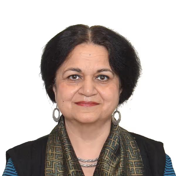 Portrait of a middle-aged woman with short black hair, wearing a patterned scarf, silver earrings, and a black outfit, smiling slightly.