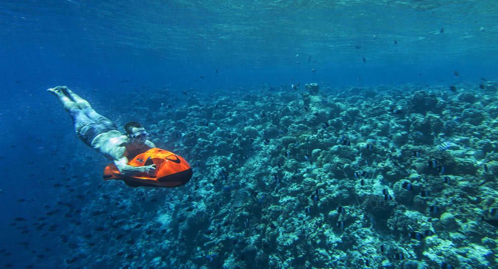 Riding Seabob sea scooter