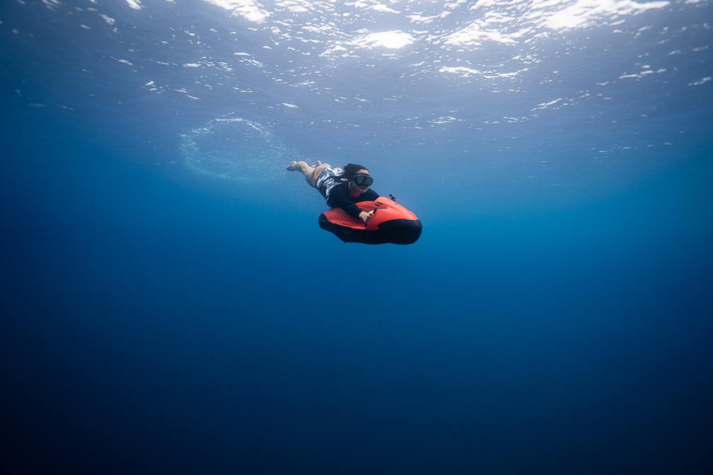 Riding Seabob sea scooter