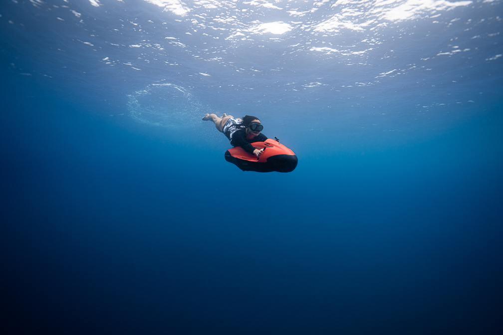 Riding Seabob sea scooter