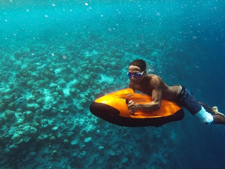 Riding Seabob sea scooter