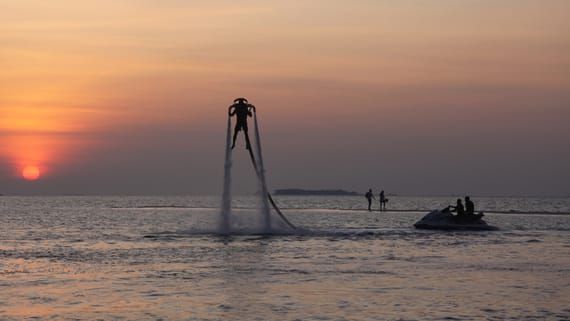 Fly board riding in the water