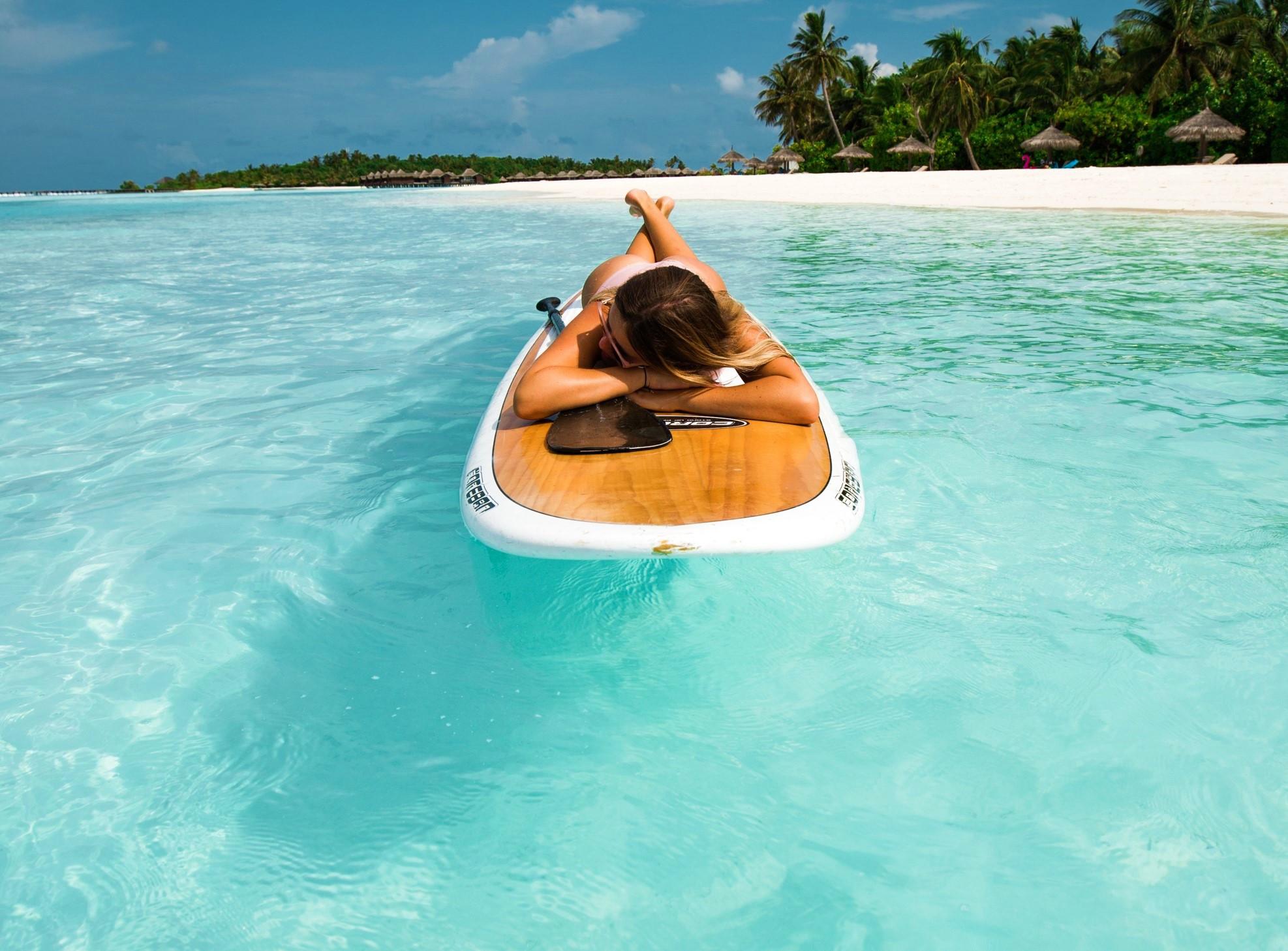 Stand up peddling in the water