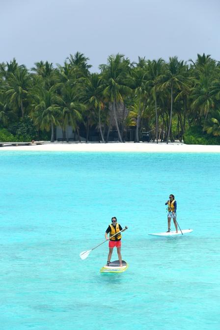 Stand up peddling in the water