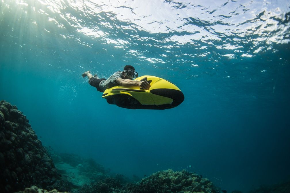 Riding Seabob sea scooter
