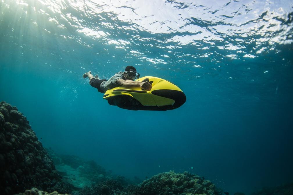 Riding Seabob sea scooter