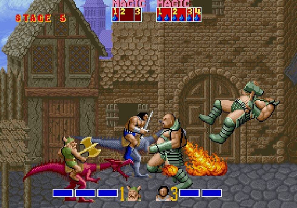 Golden Axe arcade co-op scene with two players, rideable dragons and enemies in a fantasy village.