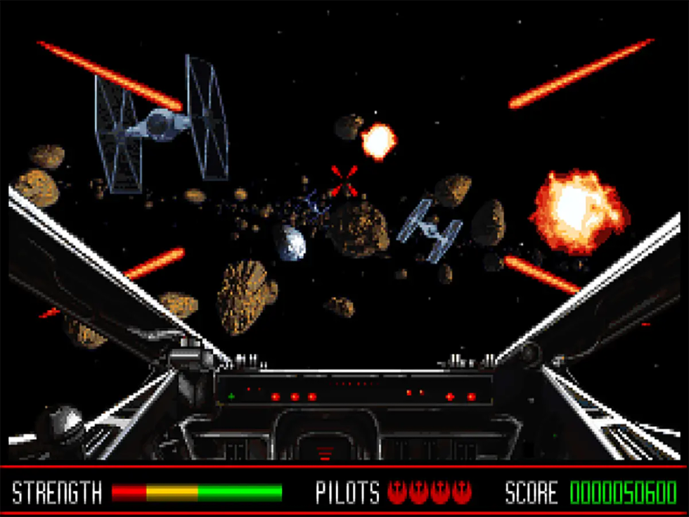 Space combat among asteroids and Imperial fighters in Star Wars: Rebel Assault
