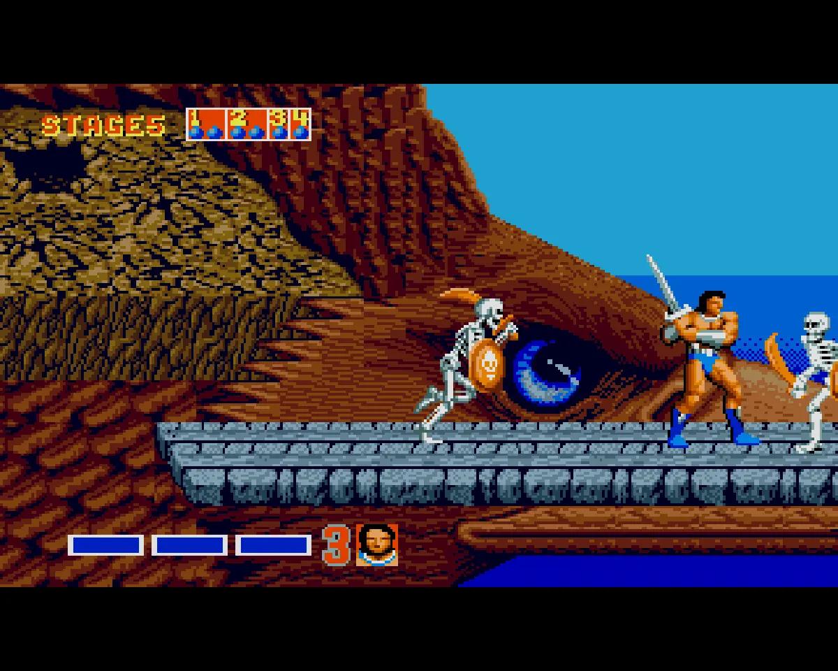 Golden Axe su Amiga con un guerriero che affronta un nemico in uno scenario fantasy.