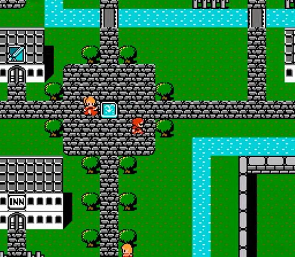Un gruppo di personaggi esplora una città nel primo Final Fantasy per Famicom