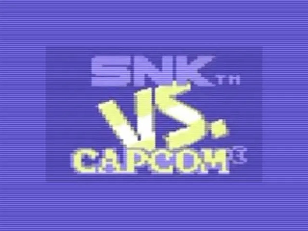 Schermata del logo SNK vs CAPCOM su sfondo blu.