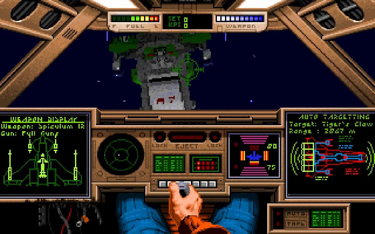 Screenshot di Wing Commander su MS-DOS durante una missione spaziale.