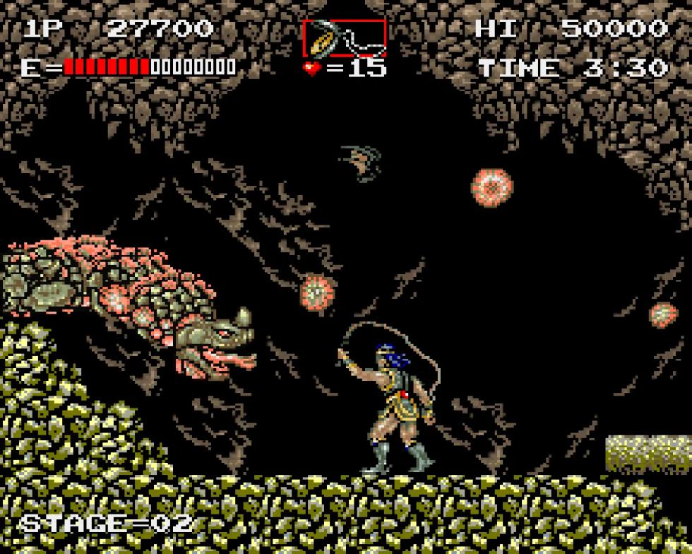 Haunted Castle arcade screenshot with Simon Belmont fighting monsters inside a cave.
