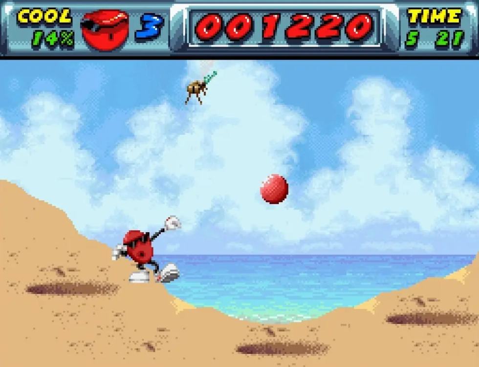 Cool Spot attraversa un livello colorato nella versione Super Nintendo del gioco.