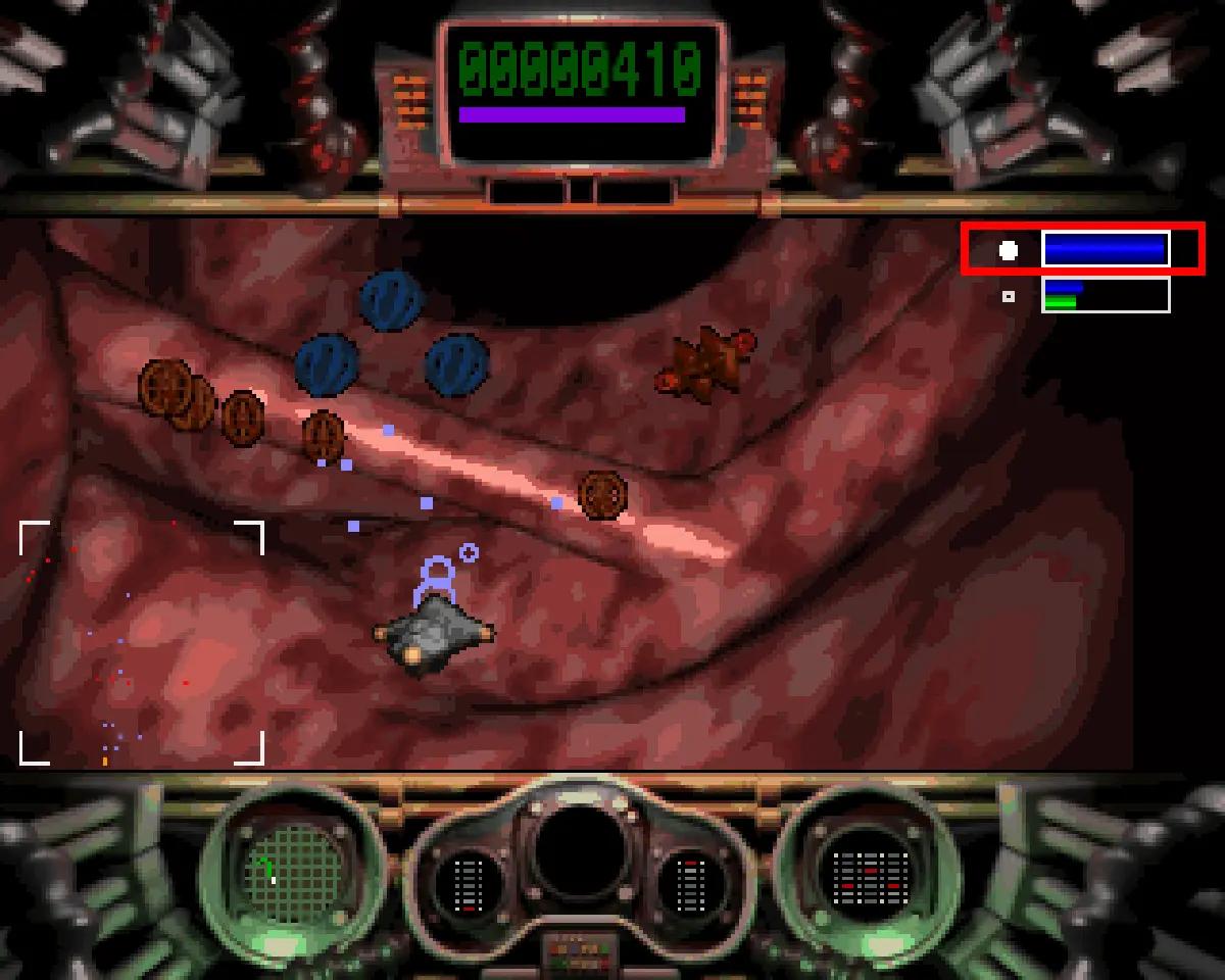 Microcosm su Amiga CD32, con la piccola astronave del giocatore all’interno di un ambiente organico.