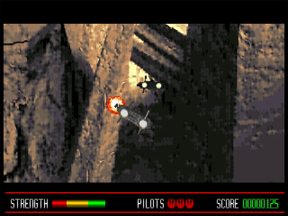 Cockpit view during a canyon combat sequence in Star Wars: Rebel Assault