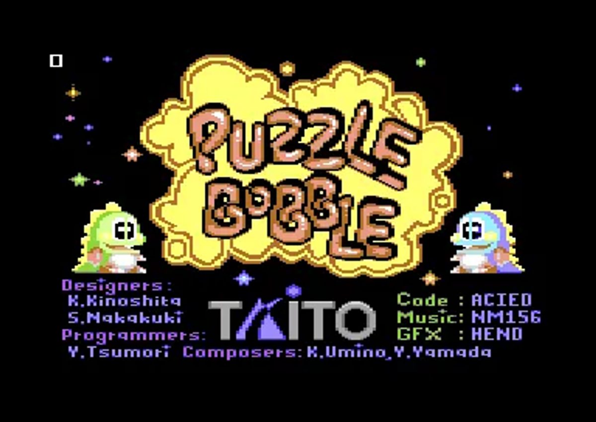 Schermata dei crediti di Puzzle Bobble con logo e due draghetti.