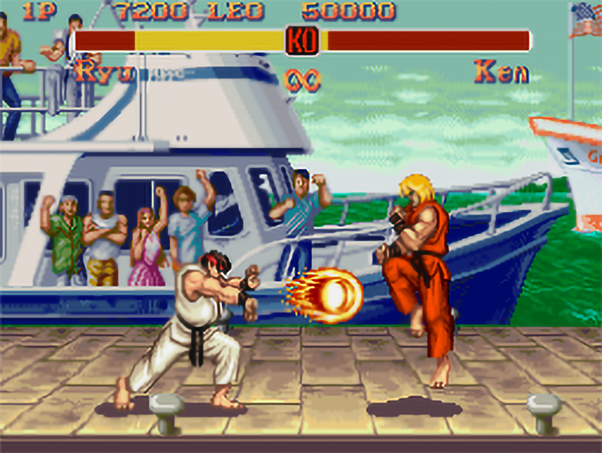 Screenshot di Super Street Fighter II per Super Nintendo con Ryu che lancia un Hadoken contro Ken.