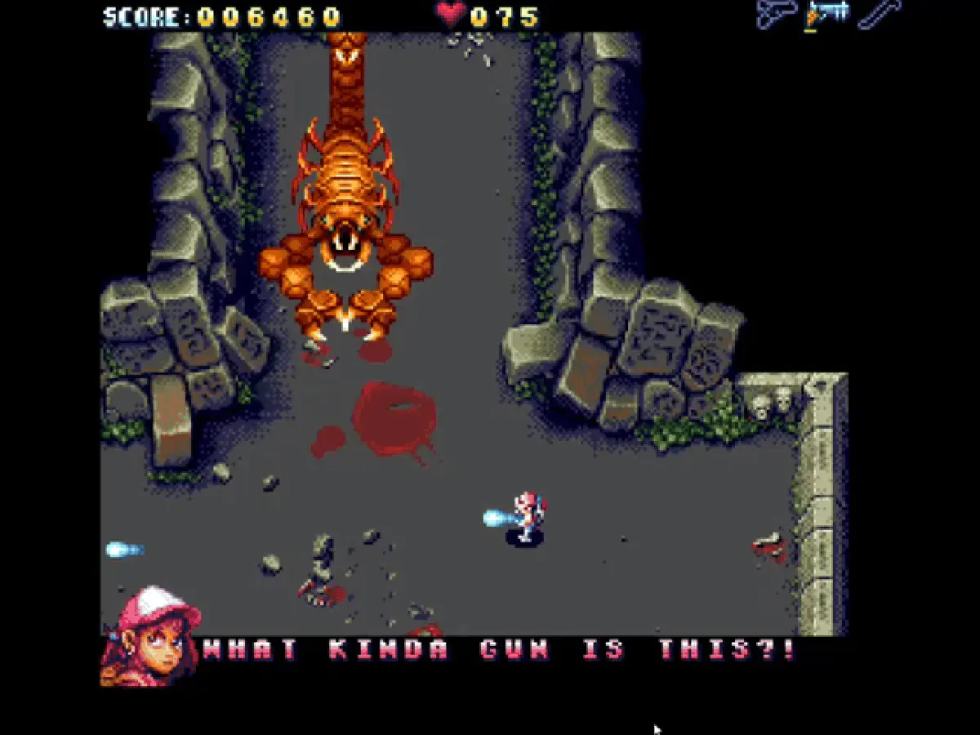 Boss fight in UrbX Warriors, with the player firing at a large creature in a rocky environment.