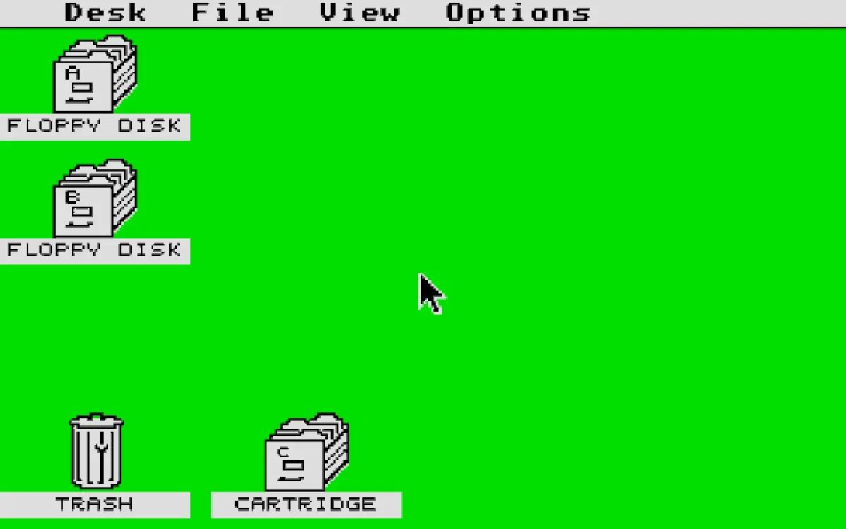 Desktop TOS su Atari ST, con icone dei floppy disk, cestino e cartuccia su sfondo verde.