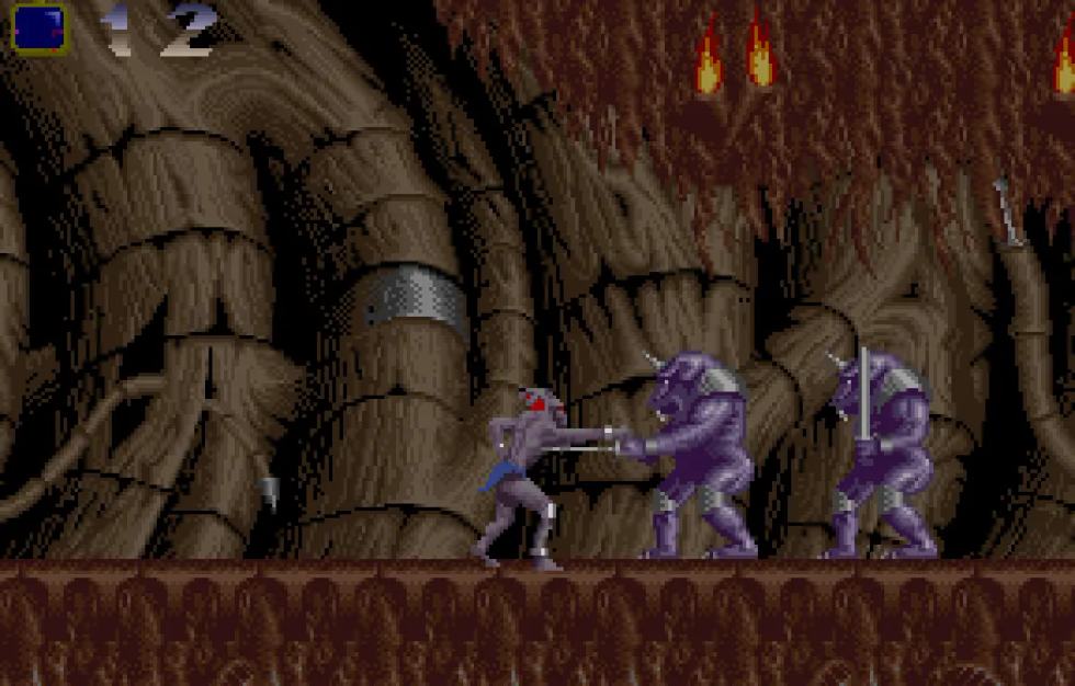 Aarbron esplora una sezione sotterranea in Shadow of the Beast per Amiga.