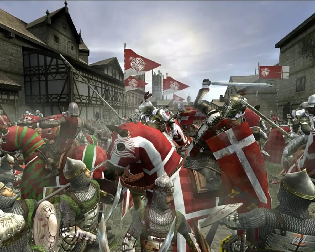 Soldati medievali combattono corpo a corpo in Medieval II: Total War.