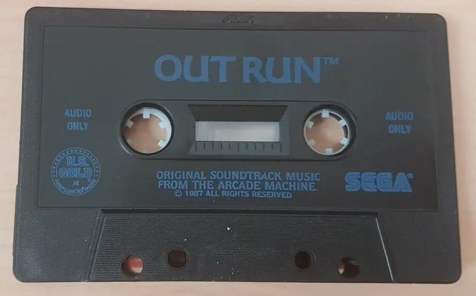 Cassetta audio originale di OutRun per MSX, pubblicata da US Gold e Sega