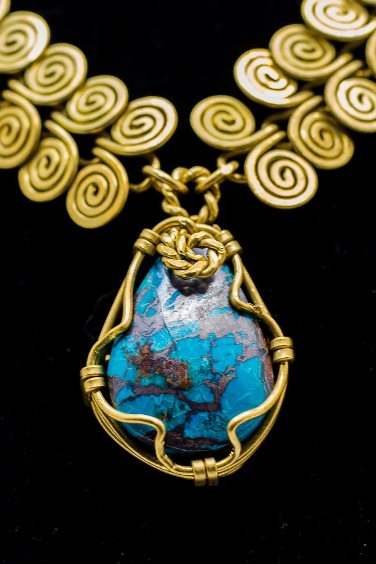 Gold wire-wrapped turquoise pendant, detail