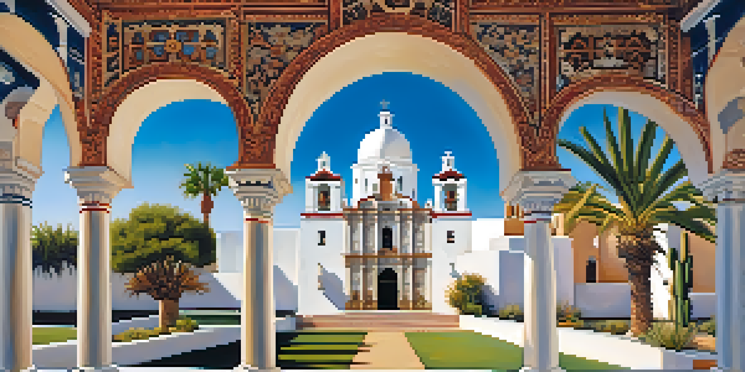 A historic mission building with white walls and domes, surrounded by desert plants under a blue sky.