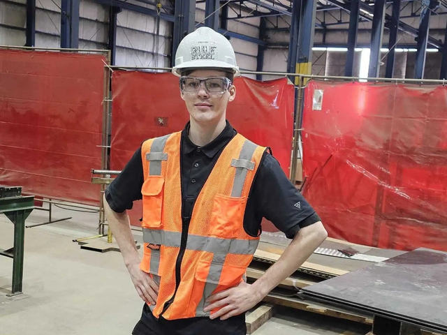 Rule Steel team member on a metal manufacturing floor