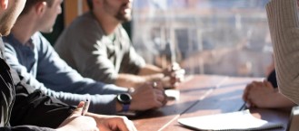 Business team collaborating around a table