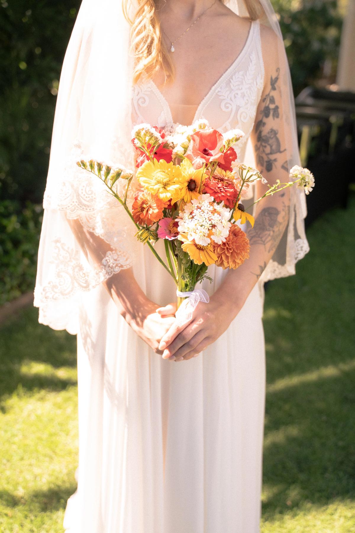 Bride holding bouquet of flowers 