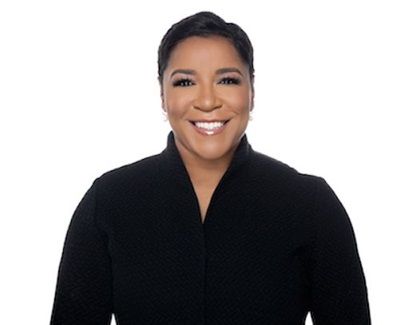 A headshot of Stacy Barton, an MS activist and congressional chief of staff.