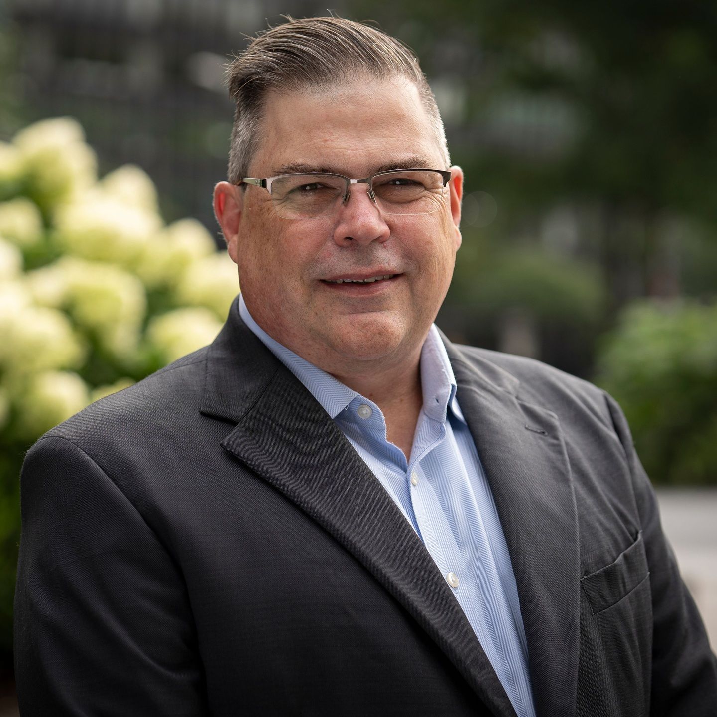 A headshot of Tim Coetzee