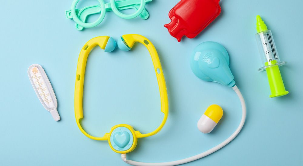 The contents of a toy doctor's kit.