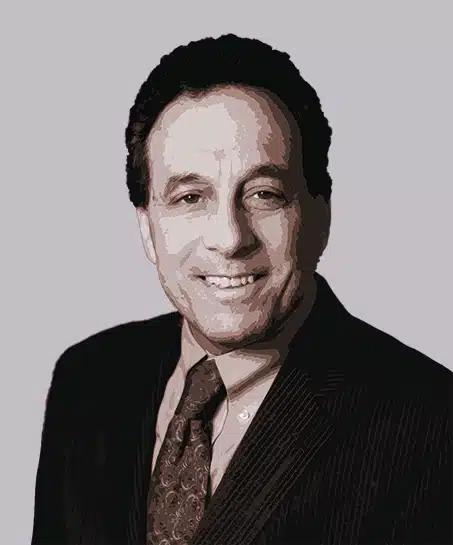 A stylized headshot of Kenneth Bandler