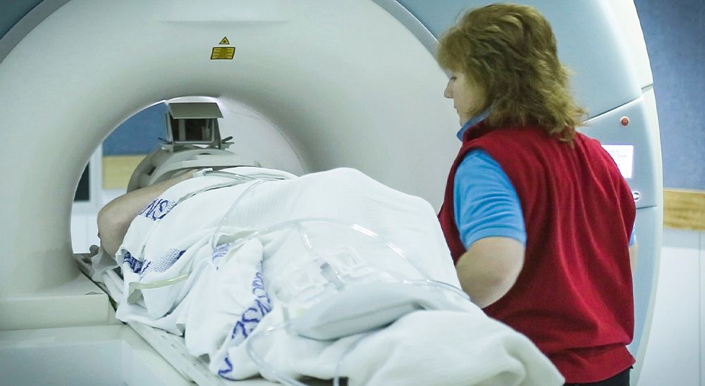 A person gets an MRI